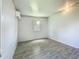 Bright bedroom with new tile floors and window at 207 Kay St, Auburndale, FL 33823