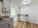 Kitchen-adjacent eating area with new flooring at 207 Kay St, Auburndale, FL 33823