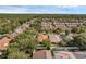 Aerial view of a lovely community surrounded by lush landscaping, a wonderful place to call home at 215 Foxglove Way, Deland, FL 32724
