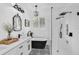 Beautiful bathroom with patterned floors, freestanding tub, glass shower, and modern fixtures at 215 Foxglove Way, Deland, FL 32724