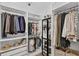 Walk-in closet featuring custom shelving and ample storage space at 215 Foxglove Way, Deland, FL 32724