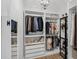 Walk-in closet featuring custom shelving and ample storage space at 215 Foxglove Way, Deland, FL 32724