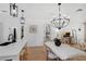 Open floor plan combines kitchen and living areas with stylish decor and natural light at 215 Foxglove Way, Deland, FL 32724