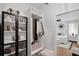 Bright walk-in closet with custom shelving and organization system leads to a bedroom at 215 Foxglove Way, Deland, FL 32724