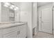 Bathroom boasts a vanity with granite countertops, a shower, and a linen closet at 236 Afton Sq # 109, Altamonte Springs, FL 32714