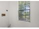 Bright laundry room with a window allowing for ample natural light at 236 Afton Sq # 109, Altamonte Springs, FL 32714