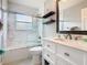 A well-lit bathroom with a shower-tub combination and modern vanity at 2705 Grand Harbour Ct, Kissimmee, FL 34747