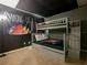 Fun bunk beds and Among Us wall decor make this room kid friendly at 2705 Grand Harbour Ct, Kissimmee, FL 34747