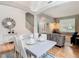 Bright dining area connecting to the living room, featuring stylish decor and natural light at 2705 Grand Harbour Ct, Kissimmee, FL 34747