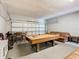 Spacious garage featuring a pool table, seating area, and ample storage space at 2705 Grand Harbour Ct, Kissimmee, FL 34747