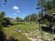 View of the expansive backyard with a gazebo with room for outdoor activities and gatherings at 2798 Beckwith St, Deltona, FL 32738