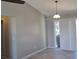Open-concept dining area with tile flooring and sliding glass doors, perfect for entertaining and enjoying the natural light at 2798 Beckwith St, Deltona, FL 32738