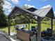 Cozy outdoor gazebo area, perfect for relaxing and entertaining with comfortable seating at 2798 Beckwith St, Deltona, FL 32738