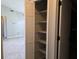 Kitchen pantry with open shelving for optimal storage and organization at 2798 Beckwith St, Deltona, FL 32738
