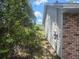 Home's side exterior features a traditional siding and a standard window at 2798 Beckwith St, Deltona, FL 32738