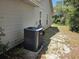 Home's side yard exterior features an HVAC and traditional siding at 2798 Beckwith St, Deltona, FL 32738