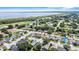 An aerial view of a quiet residential neighborhood near a lake at 2980 Cool Breeze Cir, St Cloud, FL 34769