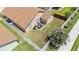 Aerial view of fenced backyard featuring patio furniture and lush green lawn at 2980 Cool Breeze Cir, St Cloud, FL 34769