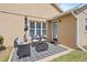 Cozy back patio with comfortable seating for outdoor relaxation and entertaining at 2980 Cool Breeze Cir, St Cloud, FL 34769