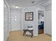 Inviting foyer features neutral tile flooring, a bench, and views into the adjacent bedroom at 2980 Cool Breeze Cir, St Cloud, FL 34769
