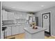 Bright kitchen features stainless steel appliances, recessed lighting and ample countertop space at 2980 Cool Breeze Cir, St Cloud, FL 34769