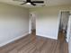 Light-filled bedroom featuring wood floors and neutral walls at 3 Spur Ct, Kissimmee, FL 34743