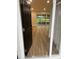 Inviting entryway showcasing modern flooring that flows seamlessly into the light-filled living space at 3 Spur Ct, Kissimmee, FL 34743