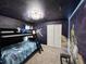 Star Wars themed bedroom with space themed painting, and bunk beds at 3012 Mahalo Dr, Davenport, FL 33897