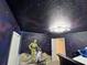 Themed bedroom with dramatic galaxy walls, custom lighting and themed characters at 3012 Mahalo Dr, Davenport, FL 33897