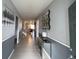 Inviting foyer with neutral walls, tile flooring, and decorative mirror adding character at 3012 Mahalo Dr, Davenport, FL 33897