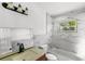 Bathroom with a tub and a marble tile surround at 3115 Avenue U Nw, Winter Haven, FL 33881
