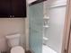 Bathroom features a walk-in shower with glass door at 3328 Davis Ter, The Villages, FL 32163