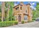 Charming two-story stucco home featuring a distinctive arched doorway and balcony at 337 Cathcart Ave # 6, Orlando, FL 32803