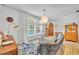 Inviting living room with large windows, wood floors, and stylish decor at 337 Cathcart Ave # 6, Orlando, FL 32803