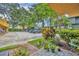 Convenient parking lot view, enhanced by landscaping and lush green trees, for easy access to the building at 337 Cathcart Ave # 6, Orlando, FL 32803