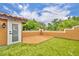 Charming rooftop patio featuring a wood deck, artificial turf, and beautiful views of surrounding greenery at 337 Cathcart Ave # 6, Orlando, FL 32803