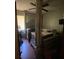 Bedroom with a four-poster bed and good natural light, perfect for relaxation and comfort at 3810 Se 22Nd Pl, Ocala, FL 34471