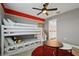Comfortable bedroom featuring bunk beds and access to an ensuite bathroom at 4185 Paragraph Dr, Kissimmee, FL 34746