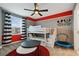 Charming bedroom with bunk beds, playful decor, and a ceiling fan for added comfort at 4185 Paragraph Dr, Kissimmee, FL 34746