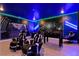 Spacious game room boasting a foosball table and arcade style gaming setup, perfect for entertainment at 4185 Paragraph Dr, Kissimmee, FL 34746