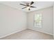 Bedroom featuring neutral walls, carpeted floors, a ceiling fan, and single window providing natural light at 4447 Brook Hollow Cir, Winter Springs, FL 32708