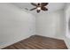 This room has vinyl floors, a ceiling fan and is bathed in light from the two windows at 4562 Lower Park Rd, Orlando, FL 32814