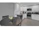 Cozy eat-in kitchen with modern appliances and a breakfast table at 503 Portland Cir, Apopka, FL 32703