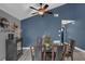 Dining room includes decor and seating for six under a ceiling fan at 503 Portland Cir, Apopka, FL 32703
