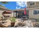 Back exterior with patio, screened-in porch, outdoor dining area, and backyard fire pit at 503 Portland Cir, Apopka, FL 32703