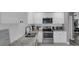 Well-equipped kitchen featuring stainless steel appliances, and ample countertop space at 503 Portland Cir, Apopka, FL 32703