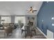 Open concept living space includes a dining area, living room and a sitting area at 503 Portland Cir, Apopka, FL 32703