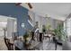Open concept living space features a dining room, living room and staircase at 503 Portland Cir, Apopka, FL 32703