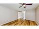 Bedroom featuring hard wood floors and a ceiling fan at 5130 Sun Palm Dr, Windermere, FL 34786