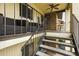Second story balcony with seating and stairs at 563 Belltower Ave # 240, Deltona, FL 32725